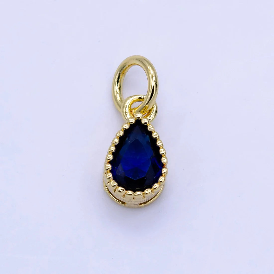 Tiny Blue Dot Charm image 0