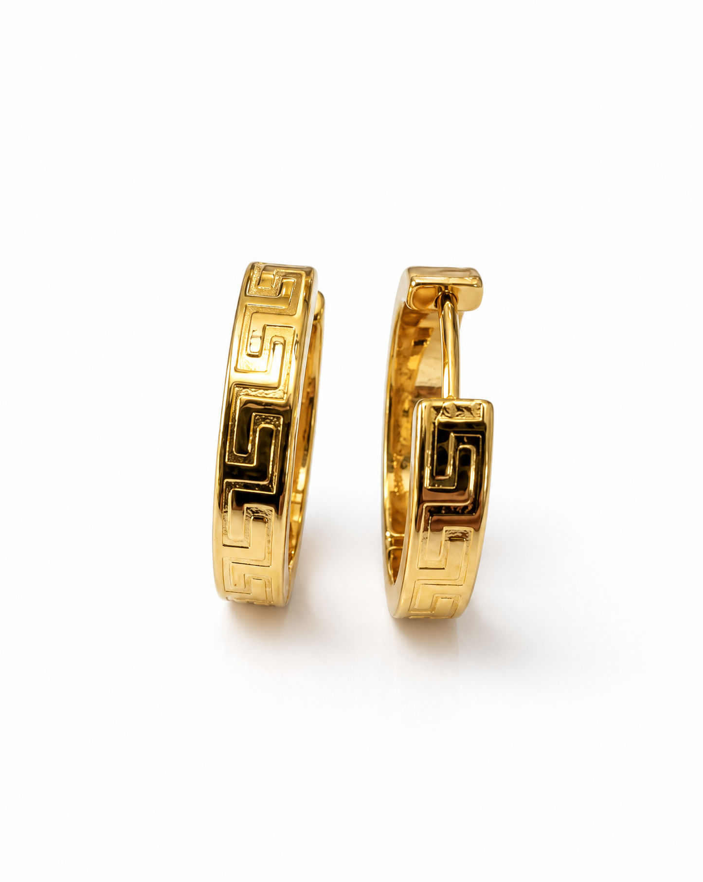 Gold hoop earrings with a Greek key design on a white background